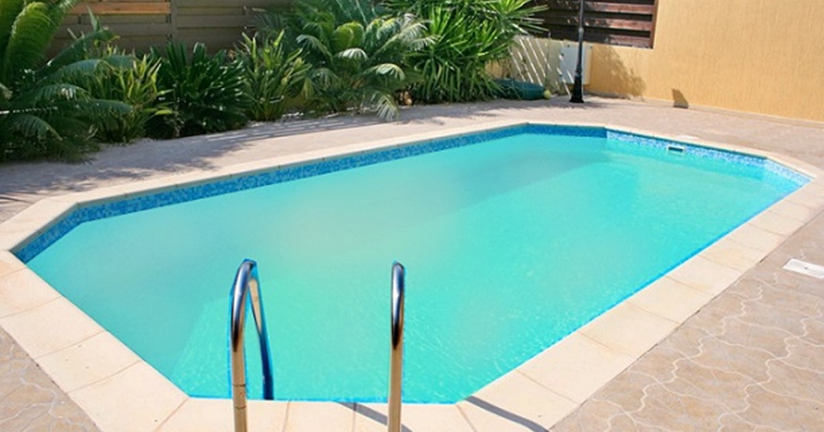 Light blue pool with cloudy water
